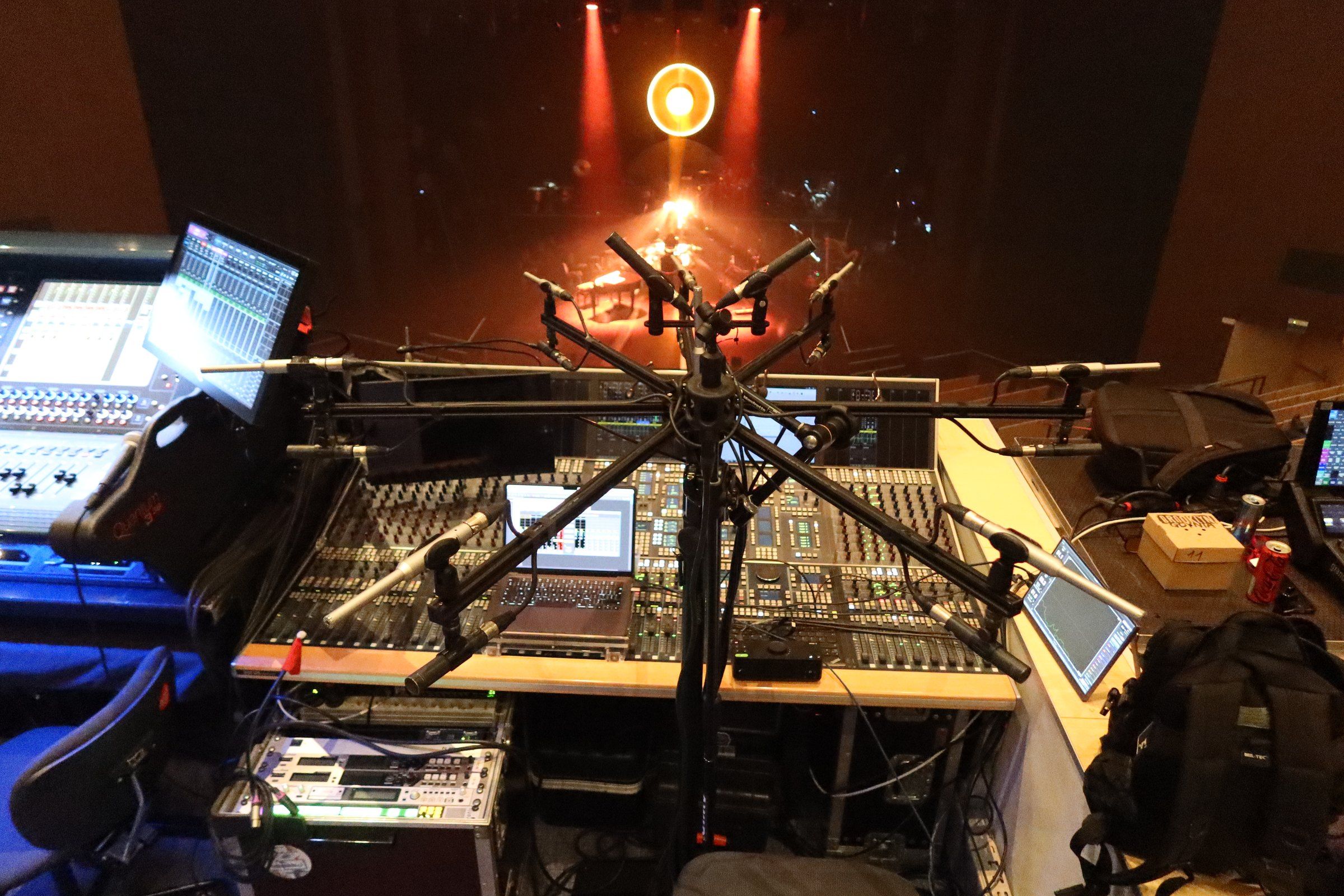 Mixing console and an immersive microphone array in front of the stage
